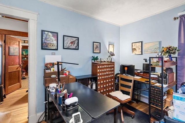 office area featuring ornamental molding and hardwood / wood-style floors