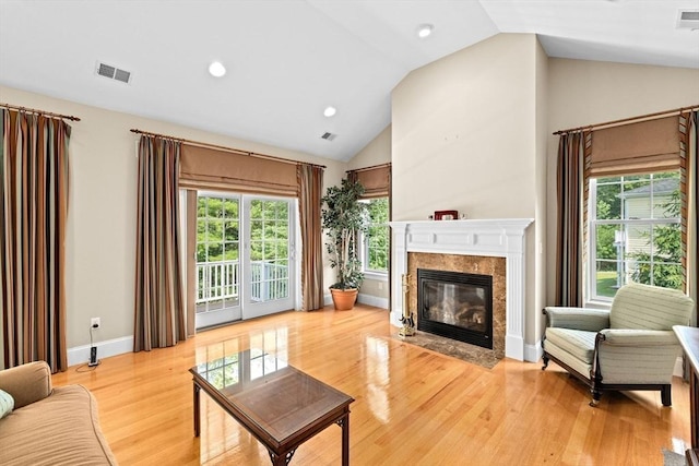 28 Ridgewood Xing Unit 28, Hingham, MA 02043 - living area featuring lofted ceiling, a fireplace, light wood-style floors, and recessed lighting