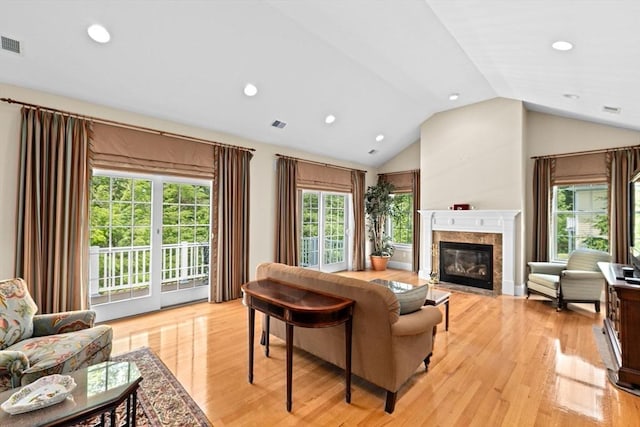 28 Ridgewood Xing Unit 28, Hingham, MA 02043 - living room with vaulted ceiling, a premium fireplace, healthy amount of natural light, light wood-style flooring, and recessed lighting