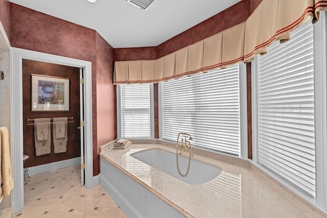 28 Ridgewood Xing Unit 28, Hingham, MA 02043 - bathroom with a garden tub and baseboards
