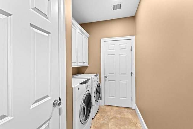 28 Ridgewood Xing Unit 28, Hingham, MA 02043 - washroom with washing machine and dryer and cabinet space