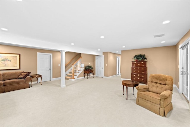 28 Ridgewood Xing Unit 28, Hingham, MA 02043 - living area with light carpet, stairs, and recessed lighting