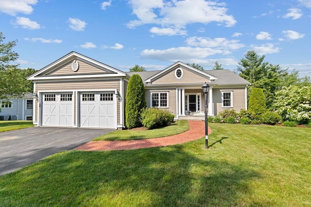 28 Ridgewood Xing Unit 28, Hingham, MA 02043 - ranch-style home with asphalt driveway, a front yard, and an attached garage