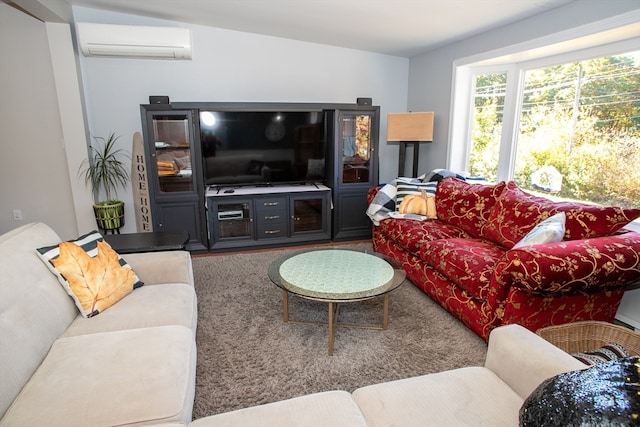 living room with a wall unit AC