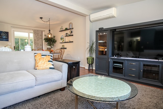 living room with dark hardwood / wood-style flooring and an AC wall unit