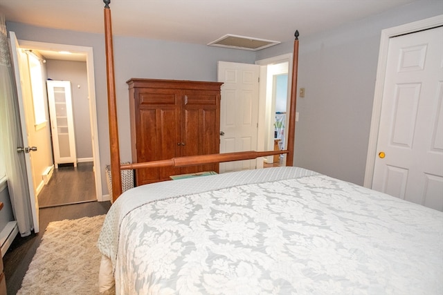 bedroom featuring dark wood-type flooring