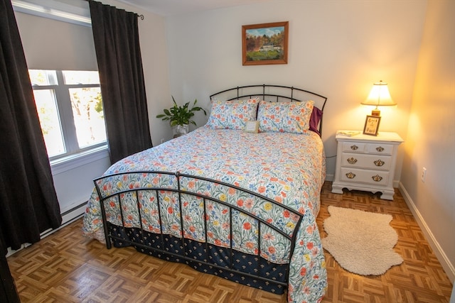 bedroom with parquet flooring