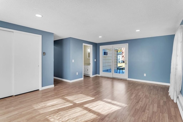 49 Wimbleton Dr, Longmeadow, MA 01106 - empty room with a textured ceiling, wood finished floors, baseboards, and recessed lighting