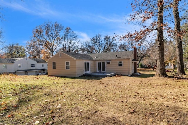 49 Wimbleton Dr, Longmeadow, MA 01106 - rear view of property with a chimney, a yard, and a patio area