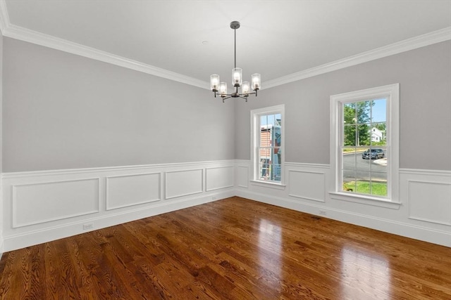 LOT11R 46 Loidie Ln, Brockton, MA 02301 - spare room featuring crown molding, a chandelier, wainscoting, and dark wood-style floors