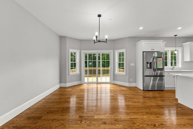 LOT11R 46 Loidie Ln, Brockton, MA 02301 - kitchen featuring stainless steel fridge with ice dispenser, a chandelier, white cabinetry, light countertops, and recessed lighting