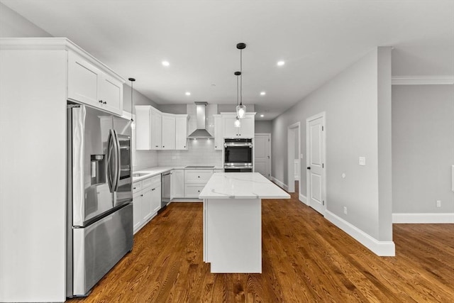 LOT11R 46 Loidie Ln, Brockton, MA 02301 - kitchen with stainless steel appliances, wall chimney exhaust hood, recessed lighting, a kitchen island, and tasteful backsplash