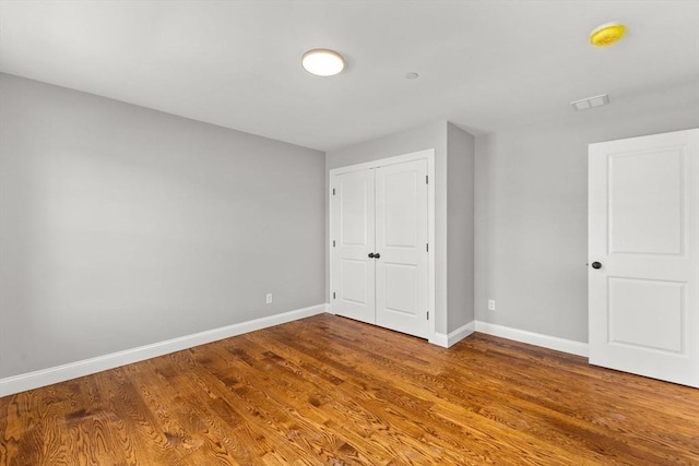 LOT11R 46 Loidie Ln, Brockton, MA 02301 - unfurnished bedroom with wood finished floors and a closet