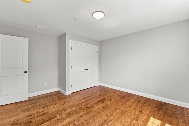 LOT11R 46 Loidie Ln, Brockton, MA 02301 - unfurnished bedroom with wood finished floors and a closet