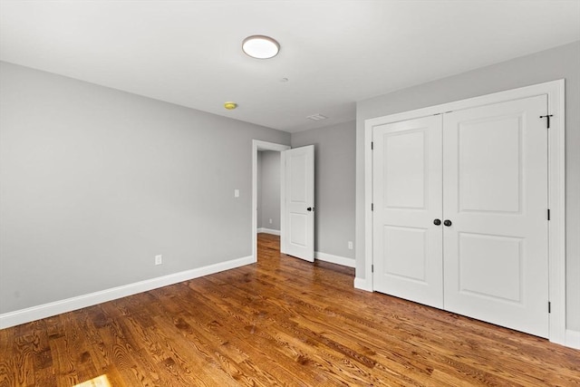 LOT11R 46 Loidie Ln, Brockton, MA 02301 - unfurnished bedroom with wood finished floors and a closet