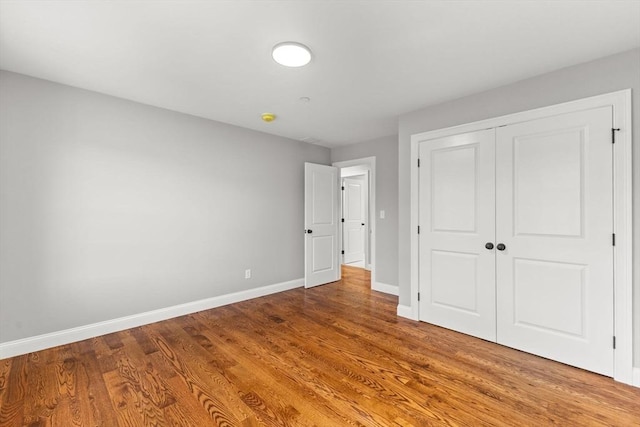 LOT11R 46 Loidie Ln, Brockton, MA 02301 - unfurnished bedroom featuring wood finished floors and a closet