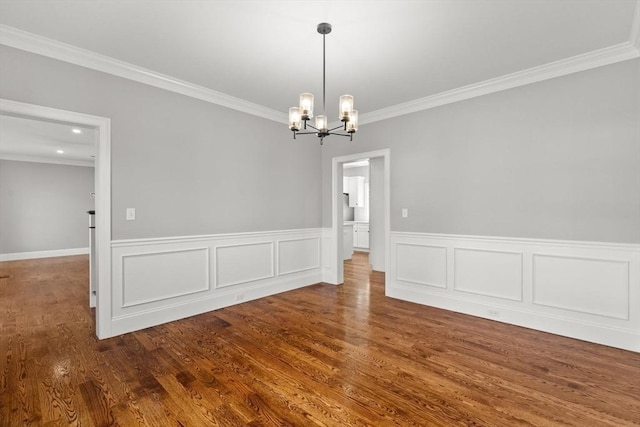 LOT11R 46 Loidie Ln, Brockton, MA 02301 - unfurnished dining area with crown molding, a chandelier, wood finished floors, and a wainscoted wall