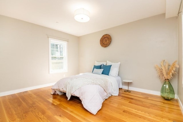 bedroom featuring hardwood / wood-style floors