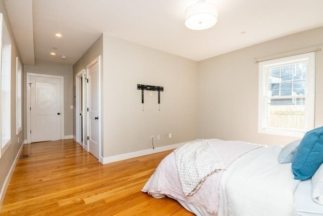 bedroom featuring light hardwood / wood-style flooring