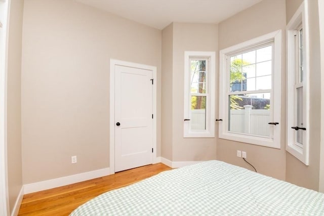 bedroom featuring hardwood / wood-style floors