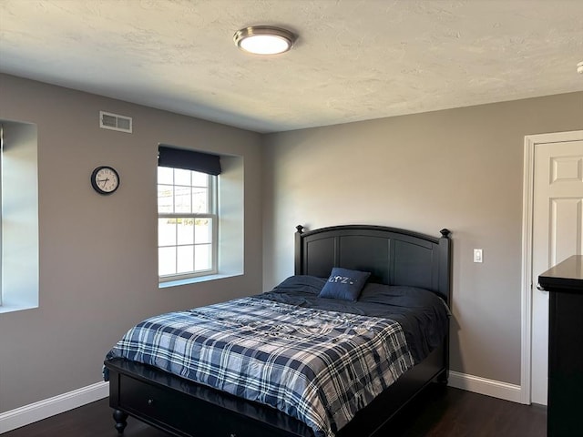 14 Cavite St, Devens, MA 01434 - bedroom with baseboards and dark wood finished floors