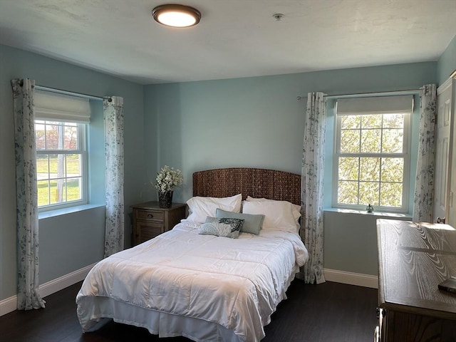 14 Cavite St, Devens, MA 01434 - bedroom featuring baseboards and dark wood-style floors