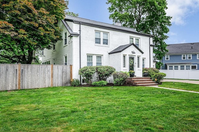 11 Florence Rd, Lowell, MA 01851 - traditional-style house with brick siding