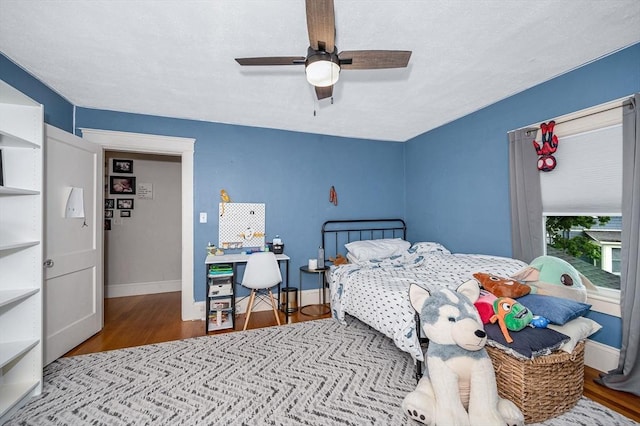 11 Florence Rd, Lowell, MA 01851 - bedroom with wood finished floors, baseboards, and a ceiling fan