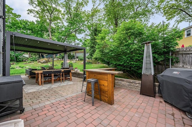 11 Florence Rd, Lowell, MA 01851 - view of patio featuring area for grilling and outdoor dining space