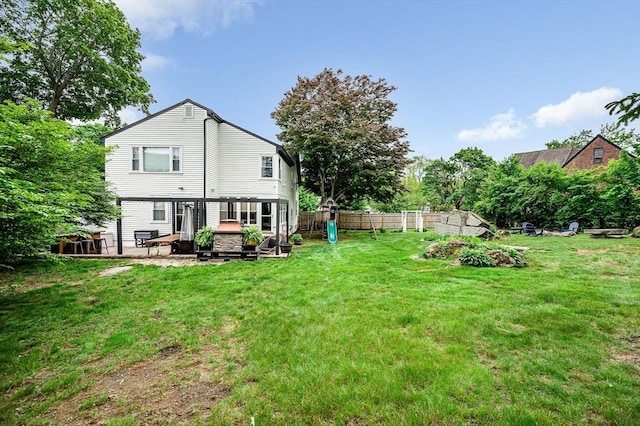11 Florence Rd, Lowell, MA 01851 - rear view of property with a patio area