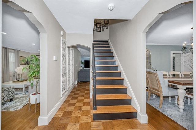 11 Florence Rd, Lowell, MA 01851 - staircase featuring arched walkways and baseboards