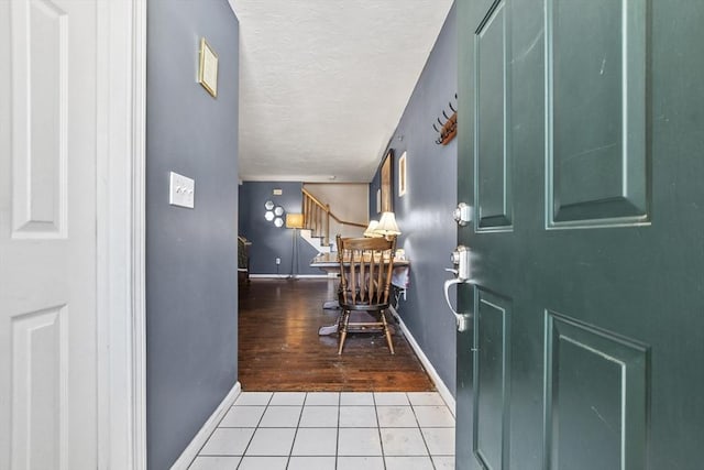 view of tiled foyer entrance