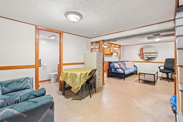 dining room with visible vents, a textured ceiling, and light floors