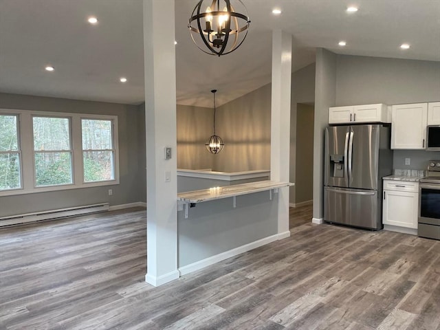 kitchen featuring an inviting chandelier, white cabinetry, and appliances with stainless steel finishes