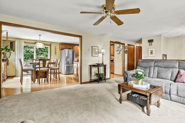 8 Messina Cir, Methuen, MA 01844 - living room with light colored carpet and a ceiling fan