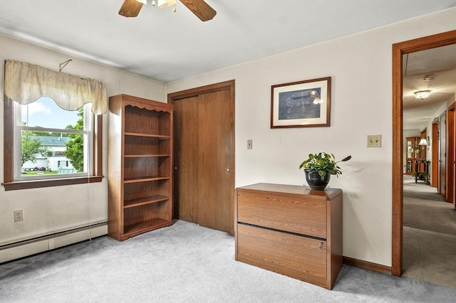 8 Messina Cir, Methuen, MA 01844 - bedroom featuring light colored carpet, a baseboard heating unit, a closet, and ceiling fan