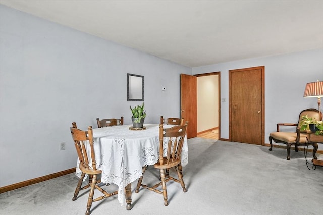 8 Messina Cir, Methuen, MA 01844 - dining area featuring light colored carpet and baseboards
