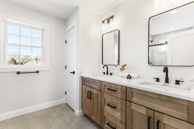 bathroom with tile patterned floors, vanity, and a shower with shower door