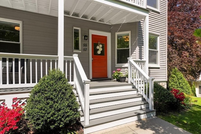 property entrance featuring a porch