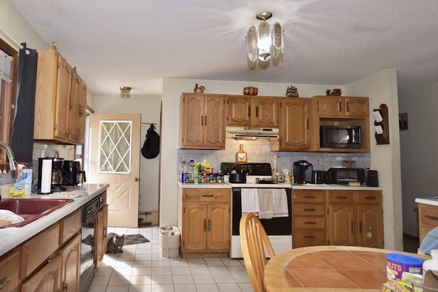 110 Lucy Little Rd, Dartmouth, MA 02747 - kitchen featuring range with electric cooktop, under cabinet range hood, light countertops, backsplash, and light tile patterned floors