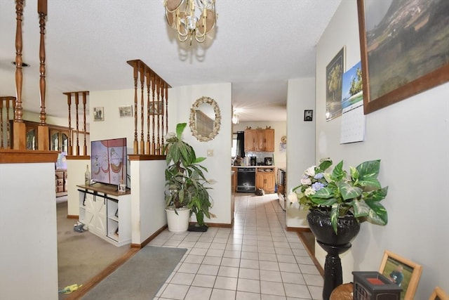 110 Lucy Little Rd, Dartmouth, MA 02747 - entryway with a chandelier and light tile patterned flooring