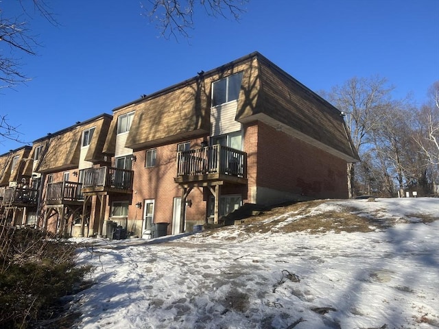 view of snow covered property