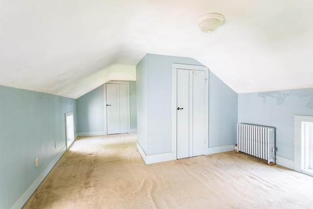 67 E Main St, West Brookfield, MA 01585 - additional living space featuring radiator, lofted ceiling, carpet flooring, and baseboards
