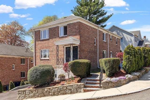 view of front of property with brick siding