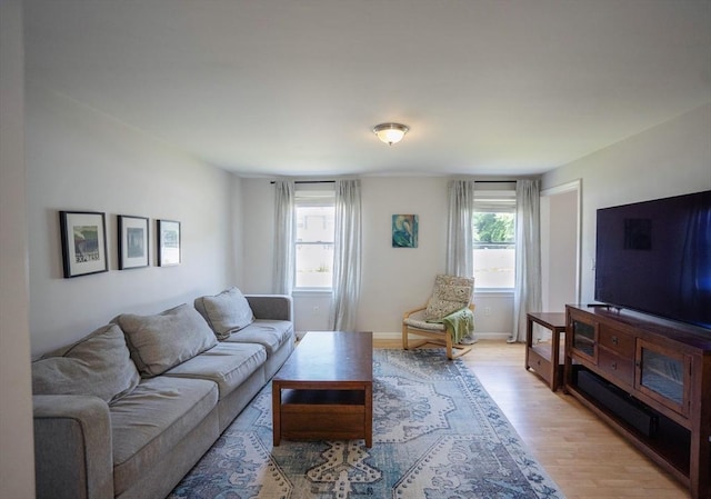 575 E St, Mansfield, MA 02048 - living room with light wood finished floors
