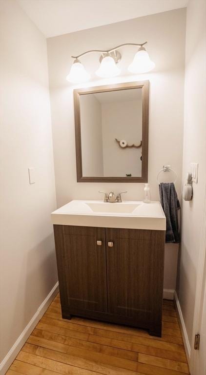 575 E St, Mansfield, MA 02048 - bathroom with vanity and wood-type flooring