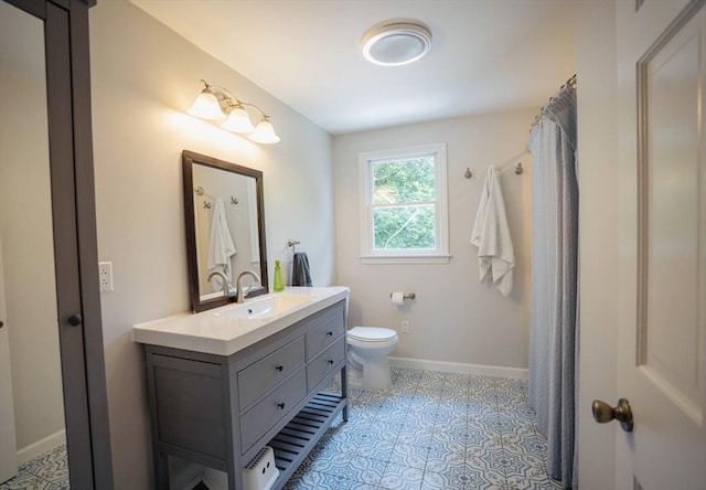 575 E St, Mansfield, MA 02048 - full bath featuring vanity and toilet