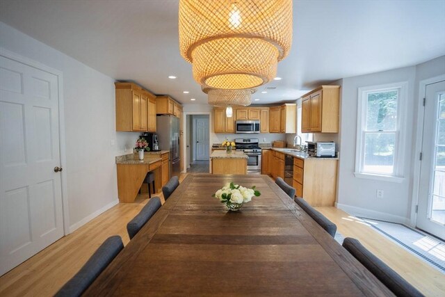 575 E St, Mansfield, MA 02048 - dining room with a chandelier, healthy amount of natural light, light wood finished floors, and recessed lighting