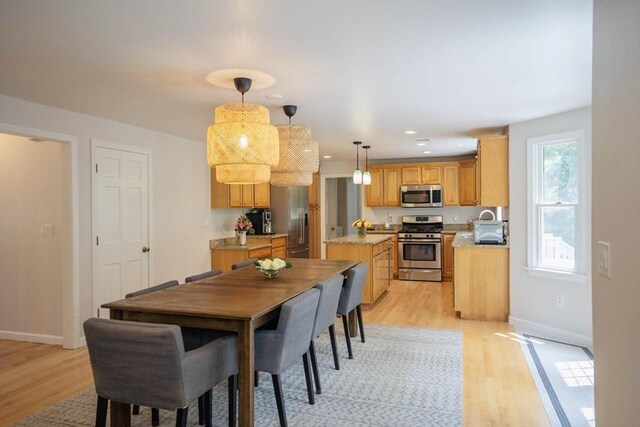 575 E St, Mansfield, MA 02048 - dining area featuring light wood-style floors and recessed lighting