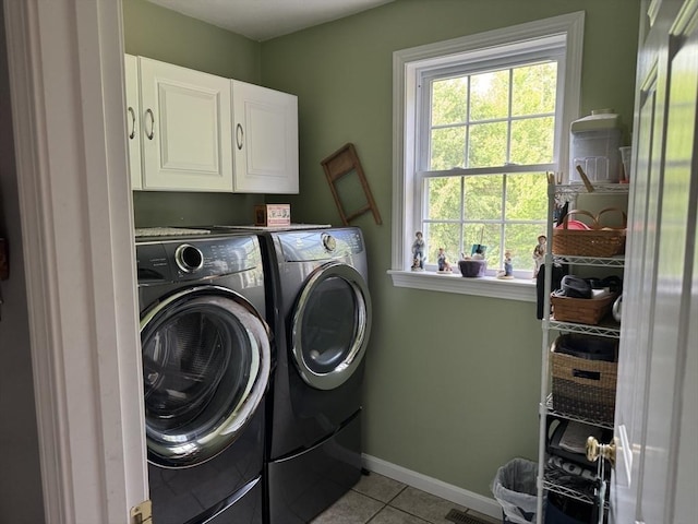 5 Gannett Way, Hopedale, MA 01747 - washroom featuring washer and dryer, cabinet space, and light tile patterned floors